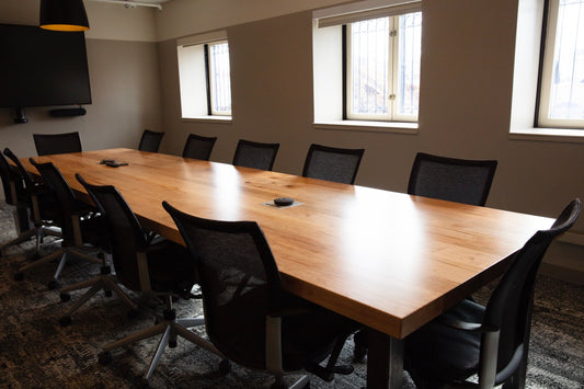Beautiful wooden conference table with seating for 11