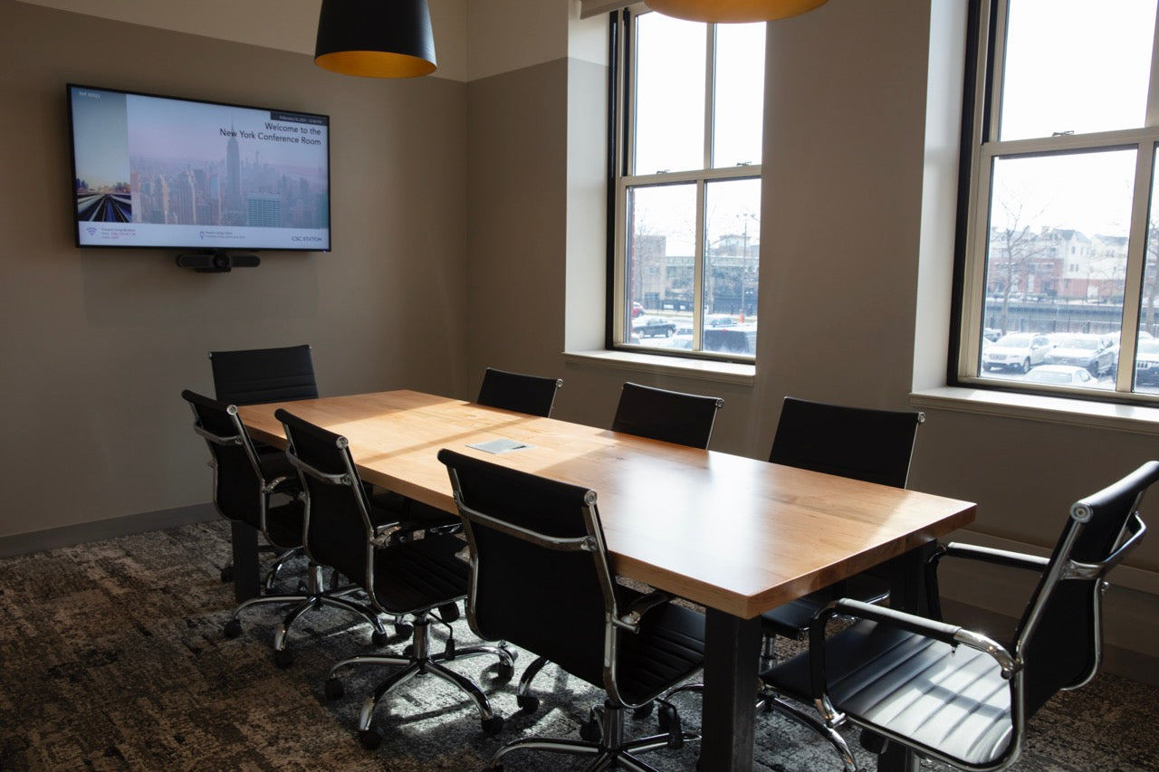 Medium size wooden conference table made from local materials