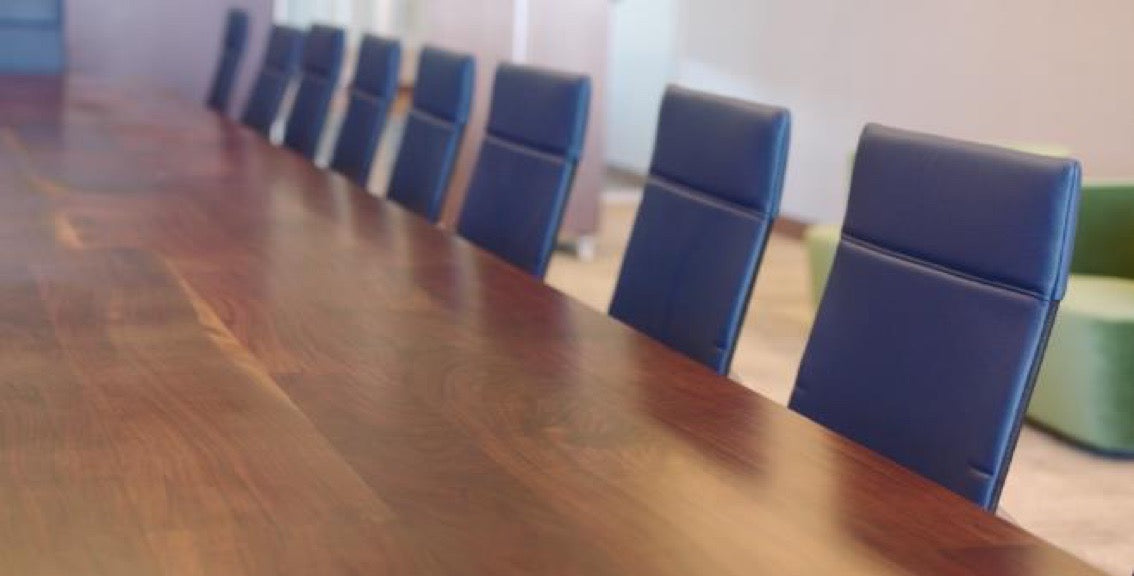 Dark wood top on conference table at office