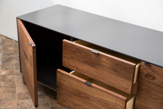 Dark wood credenza with two drawers for storage