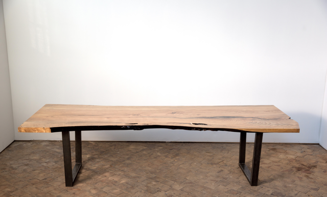 Rectangular dining table with raw wood edge