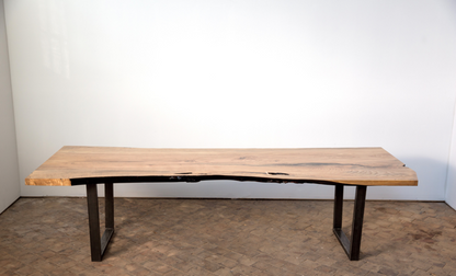 Rectangular dining table with raw wood edge
