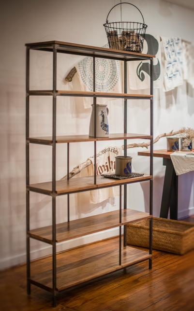 Handcrafted wooden shelf with decorative display